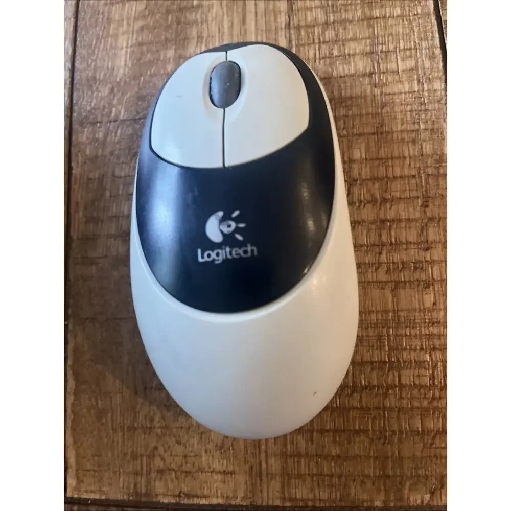 Logitech M-RN67 Optical Mouse White Cordless 2-Button Scroll. No Receiver